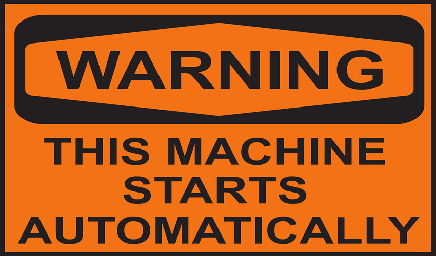 warning sign saying this machine starts automatically