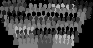 stylised image of a crowd using outline figures in black and white