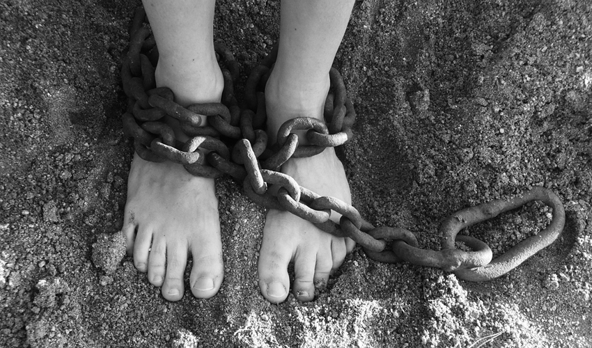 Someone's feet in chains