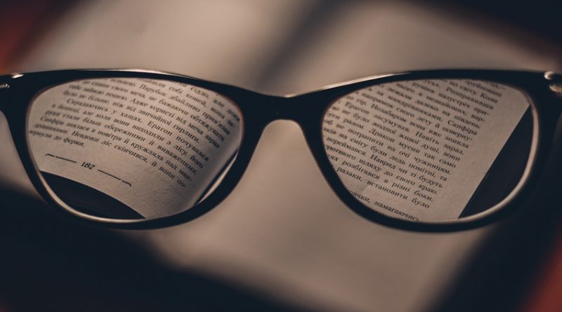 In focus text vseen through a pair of reading spectacles