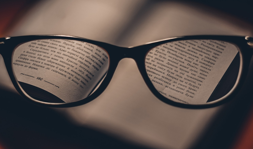 In focus text vseen through a pair of reading spectacles