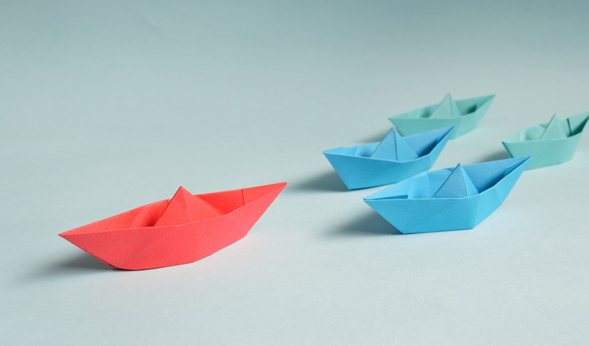 red and blue paper boats