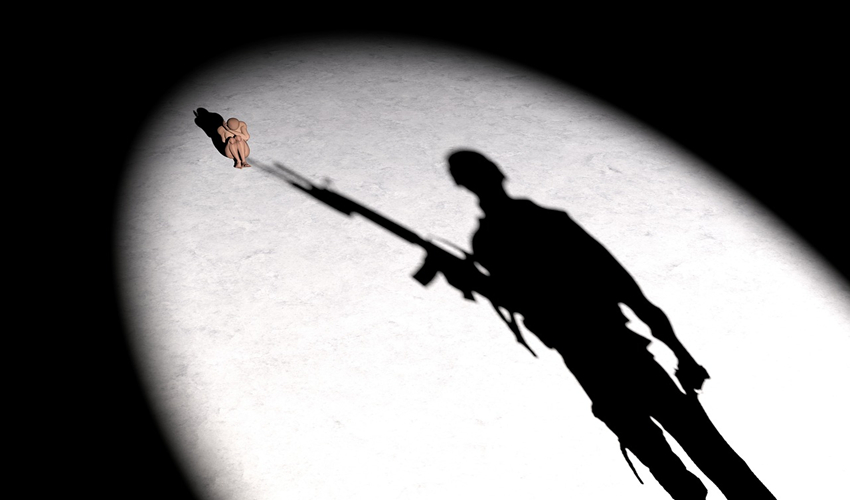silhouette of soldier pointing gun at frightened model of a woman