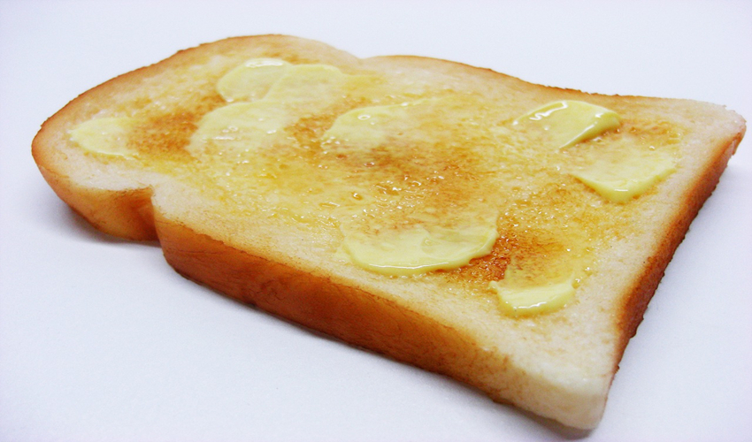 Butter melting on a slice of toast