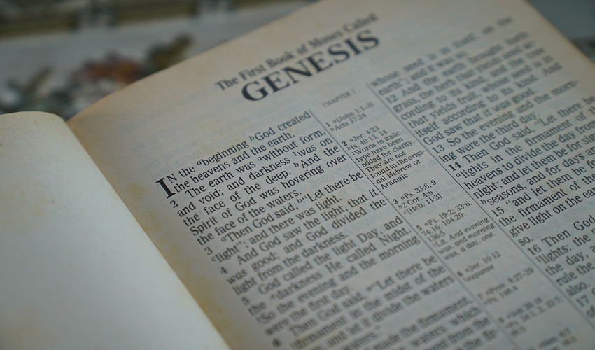 Bible opened at start of Genesis